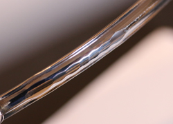 Planishing marks from hallmarking at the London Assay Office